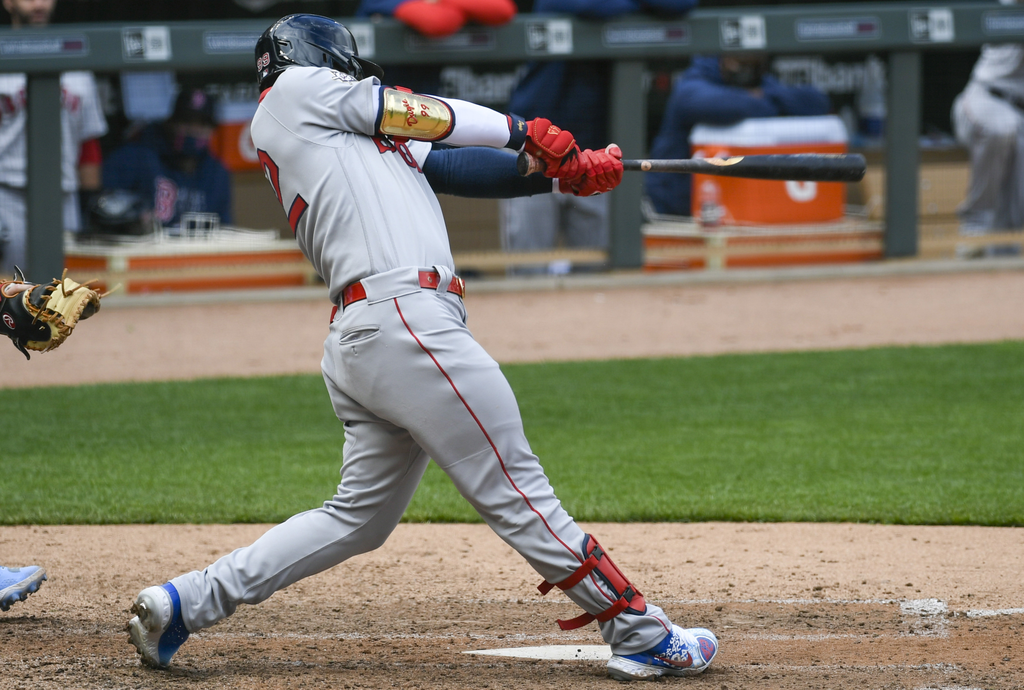 Lefty Red Sox hitter swinging bat