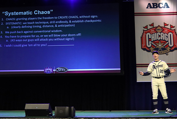 Kevin Graber in full uniform on stage at 2022 ABCA Convention discussing systematic chaos