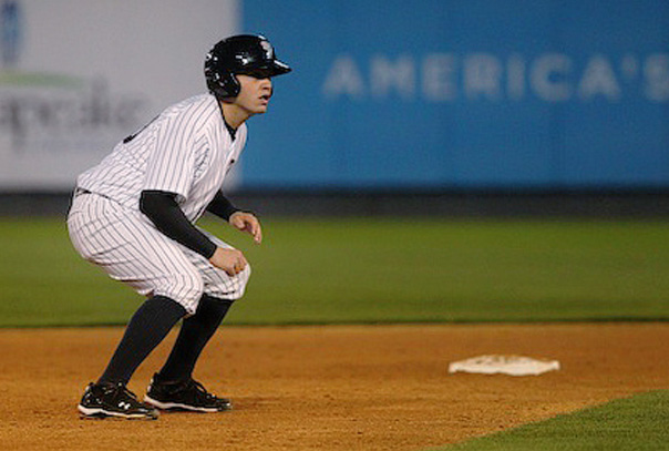 A baserunner taking a lead from second.