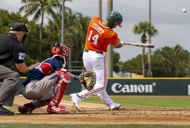 A batter hitting a homerun.