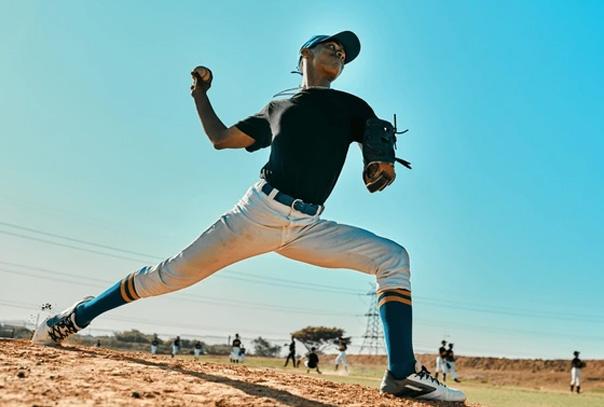 A baseball pitcher throwing a pitch
