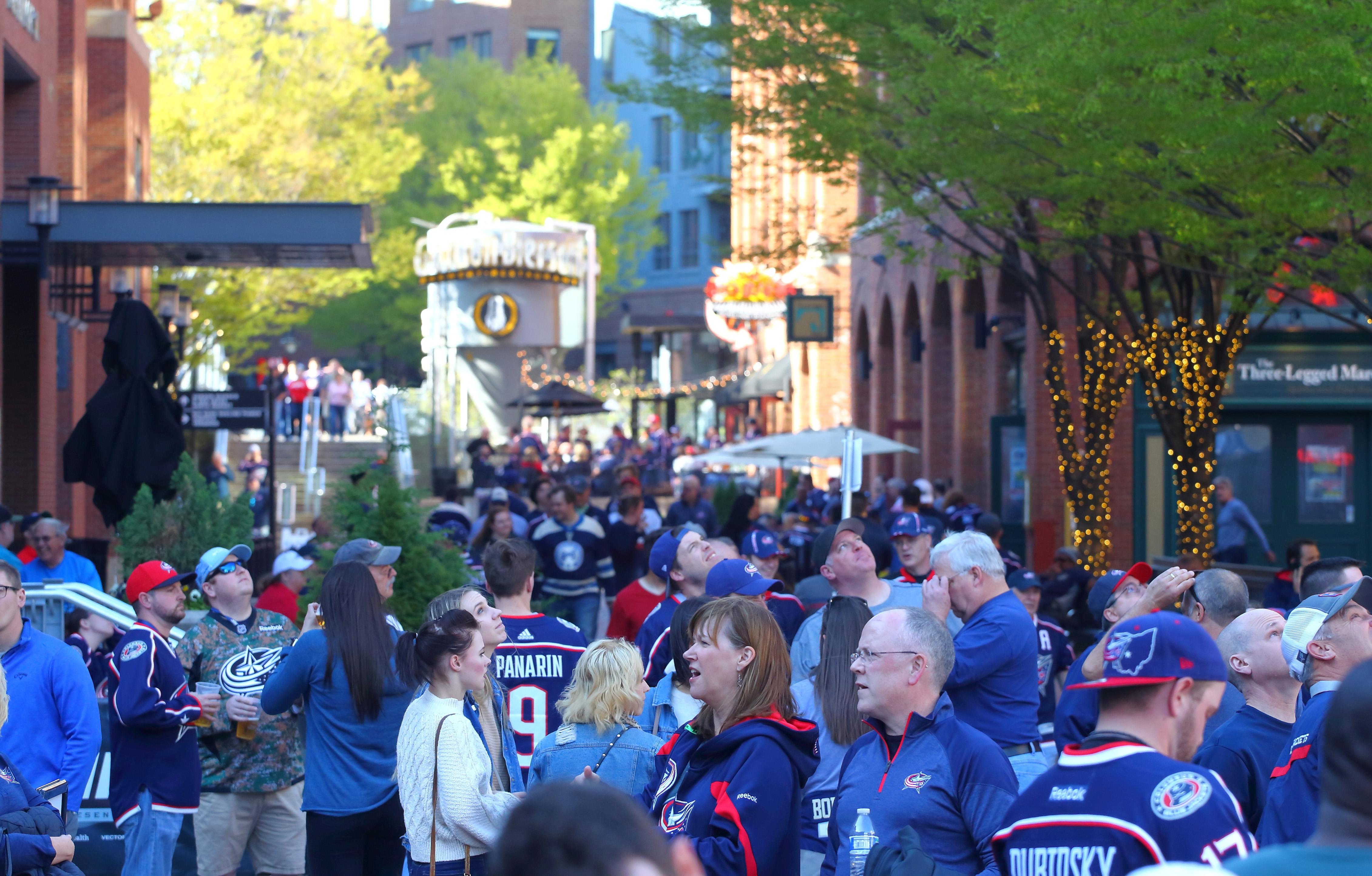 Crowd of people exploring the downtown Columbus arena district