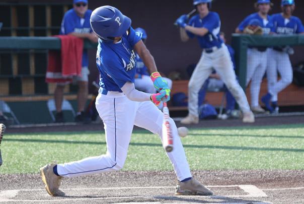 Youth hitter swinging bat